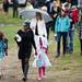 Family and friends walk through rain from the paring lot to the Convocation Center for the Eastern Michigan University Spring Commencement on Sunday, April 28. Daniel Brenner I AnnArbor.com